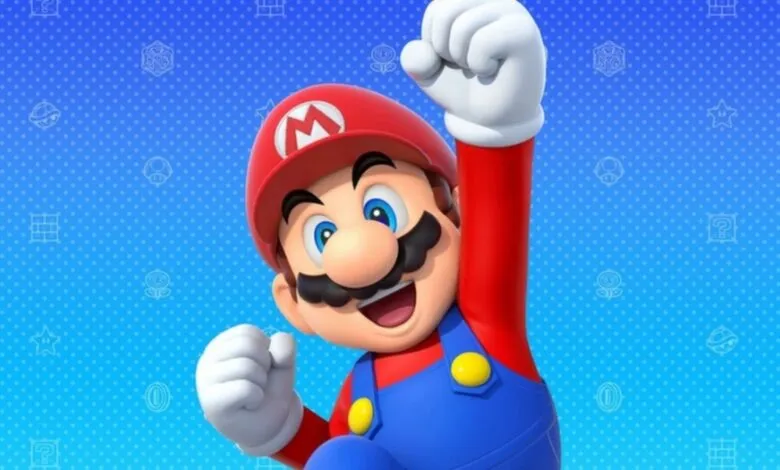 Mario character with fist raised in victory pose on blue background.
