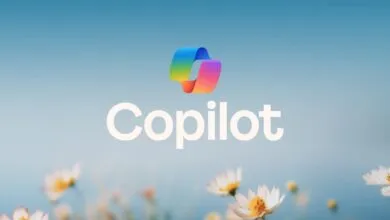 Microsoft Copilot logo with rainbow ribbon above the word 'Copilot'.