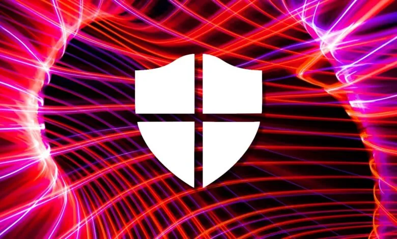 White shield icon against a vibrant, abstract background of red and purple light trails.