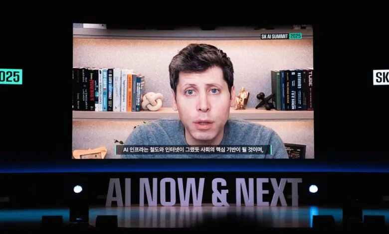 Man speaking at SK AI Summit 2025, with 'AI NOW & NEXT' displayed.