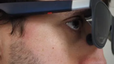 Close-up of person wearing augmented reality glasses.