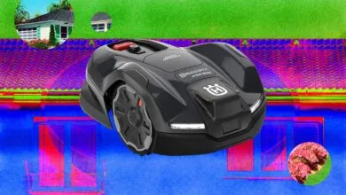Husqvarna Automower 410XE Nera on a vibrant, digitally altered lawn.
