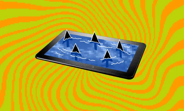 Tablet screen shows shark fins in water, symbolizing online dangers.