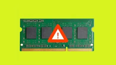 RAM module with a warning sign, indicating a potential problem.