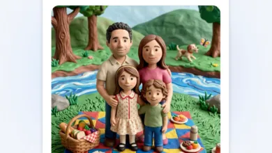 Claymation family of four enjoying a picnic by a river in a park setting.