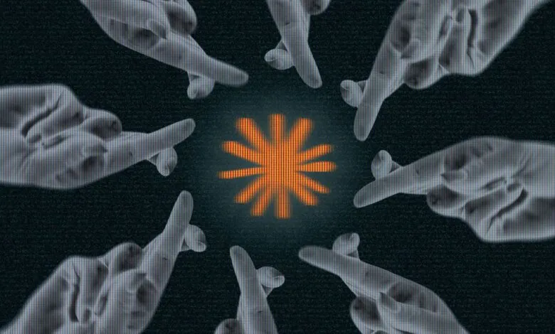 Fingers crossed around a glowing orange starburst on a dark background.