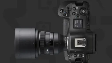 Canon EOS R1 camera with Sigma 135mm f/1.4 DG Art lens attached.