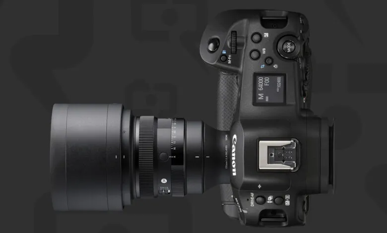 Canon EOS R1 camera with Sigma 135mm f/1.4 DG Art lens attached.