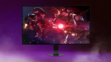 Gaming monitor displaying intense sci-fi battle scene.