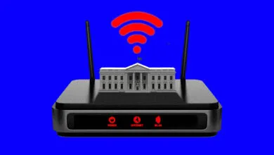 The White House sits atop a router with a red WiFi symbol above it.