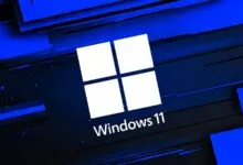 Windows 11 logo on a blue and black abstract background.