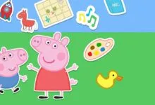 Peppa Pig and George Pig stand on green grass with colorful stickers above.