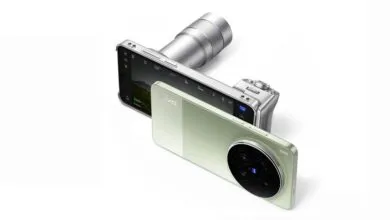 Vivo X100 Ultra smartphone with camera lens attachment.