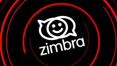 Zimbra logo with a smiling face inside speech bubbles on black background.
