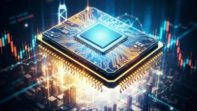 Close-up of a glowing computer chip over a cityscape and stock chart.