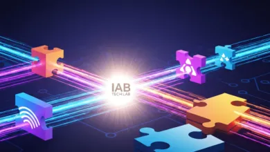IAB Tech Lab logo with colorful puzzle pieces and light streaks.