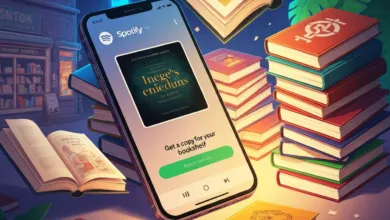Phone displays Spotify audiobook 'Inege's enieduns' surrounded by stacked books.