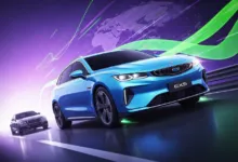 Blue Geely EXS electric car on a futuristic road with another car in the background.