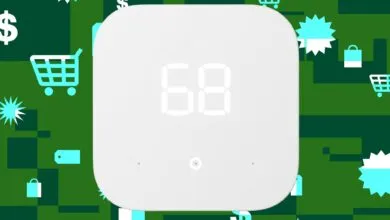 White smart thermostat displaying '68' against a green shopping-themed background.