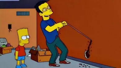 Bart Simpson watches as a man pulls a wire through a wall, creating a hole.