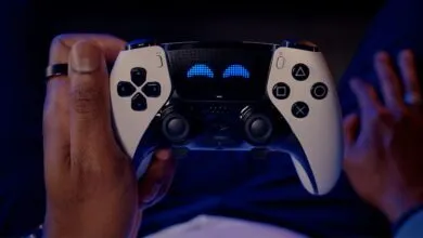 Hands holding a white and black PlayStation controller with glowing blue eyes.