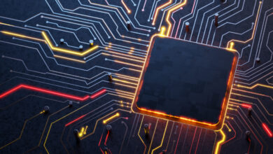 Close-up of a computer chip with glowing circuits and a dark central processor.