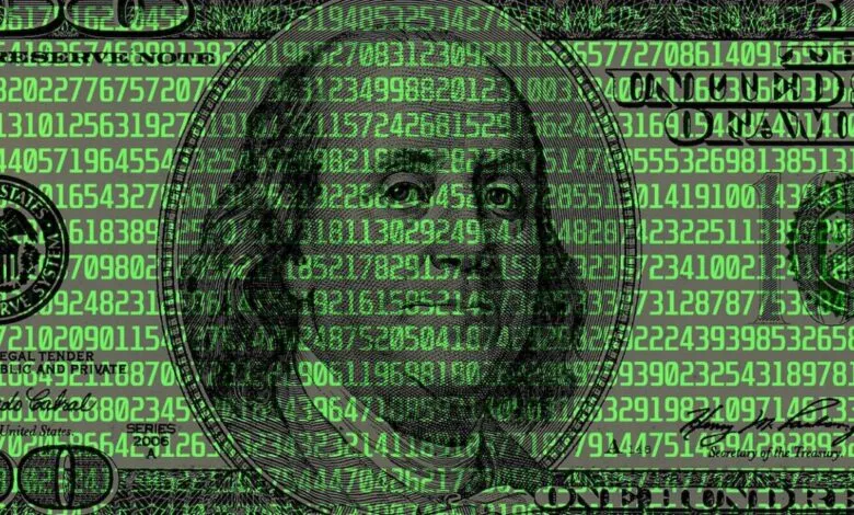 One hundred dollar bill overlaid with green digital code.