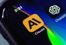 Close-up of a smartphone screen showing the Claude AI app icon and the ChatGPT app icon.