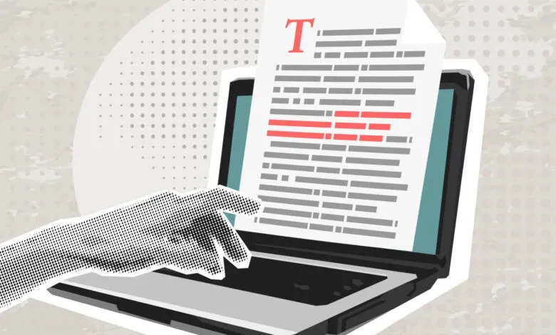 Hand interacting with laptop screen showing text document.