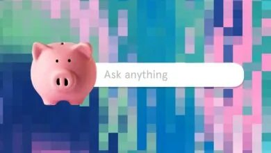 Pink piggy bank next to 'Ask anything' search bar on pixelated background.
