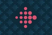 Fitbit logo made of pink circles on a dark blue patterned background.