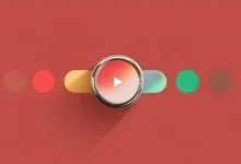 Abstract play button with colorful shapes on a red background.