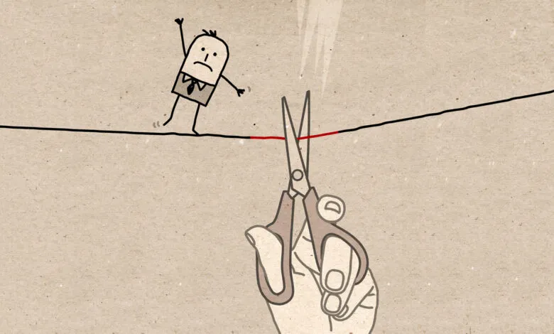 Cartoon man on tightrope as scissors cut the line, symbolizing risk.