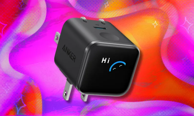 Anker charger with 'Hi' and a smiley face on the display.