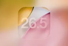Abstract icon with '26.5' in frosted glass effect on warm gradient background.