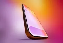 Close-up of a modern smartphone with a vibrant, colorful screen display.