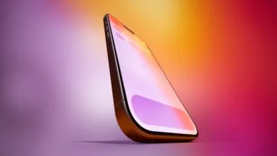 Close-up of a modern smartphone with a vibrant, colorful screen display.