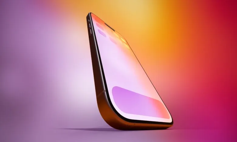 Close-up of a modern smartphone with a vibrant, colorful screen display.