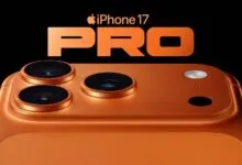 Orange iPhone 17 Pro with triple-lens camera system on a black background.