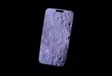 iPhone screen displays detailed lunar surface with craters, NASA logo in corner.