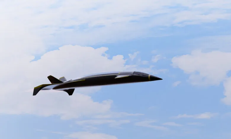 Futuristic black jet with yellow trim soars through a cloudy blue sky.