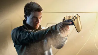 Man holds gold PlayStation 5 controller, aiming like a gun.