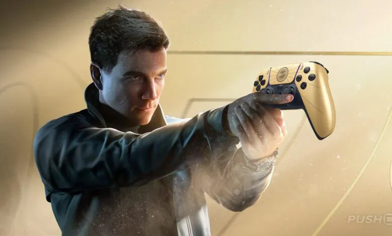 Man holds gold PlayStation 5 controller, aiming like a gun.