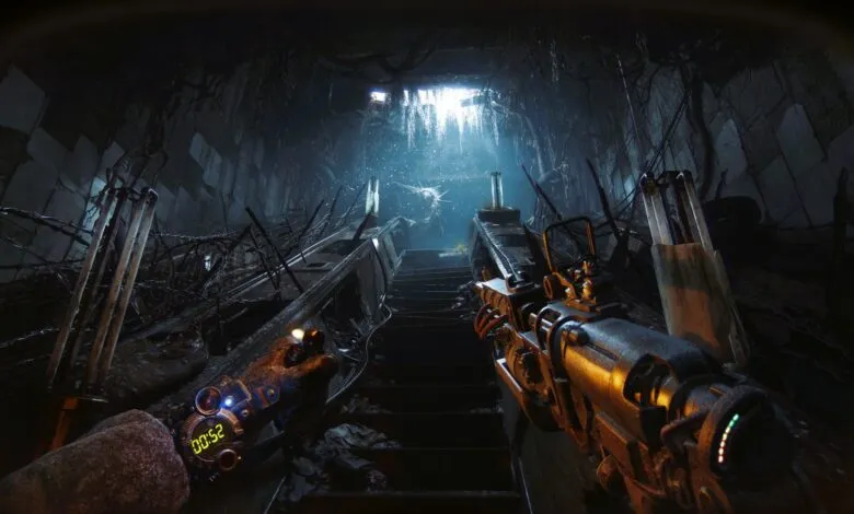 First-person view of a dark, post-apocalyptic tunnel with stairs leading to a light source.