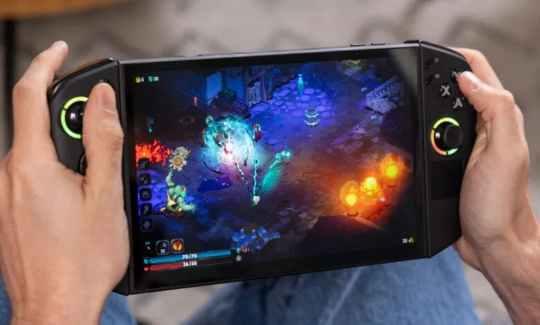 Hands holding a Lenovo Legion Go playing a colorful action RPG.
