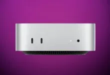 Silver Mac Mini desktop computer against a purple gradient background.