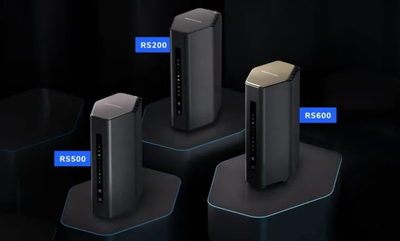 Three Netgear Nighthawk routers (RS500, RS200, RS600) on display.