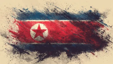 Distressed North Korean flag with paint splatter effect.