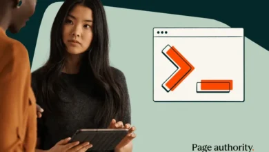 Two women discuss website authority, one holding a tablet.