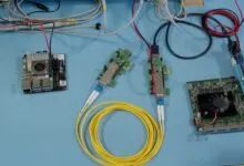 PCIe over fiber setup with Raspberry Pi and fiber optic cables.